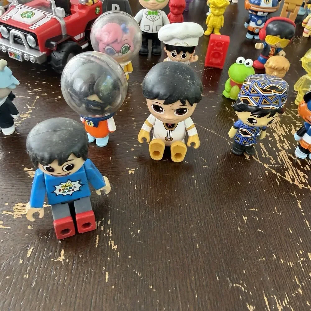 Ryan’s World Figures Lot 58 Pieces Red Titan Pandas Robots Helmet Astronauts